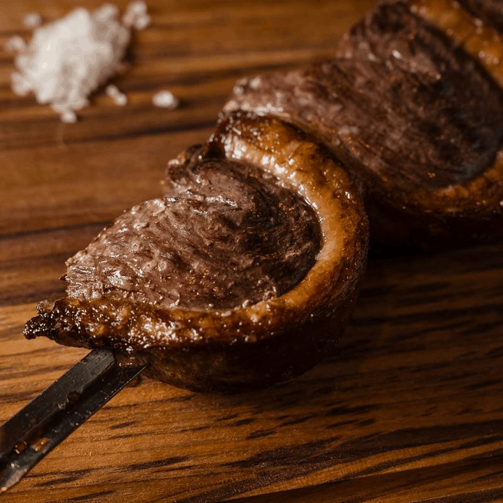Fire-roasted meats from Fogão Gaúcho's official photo gallery
